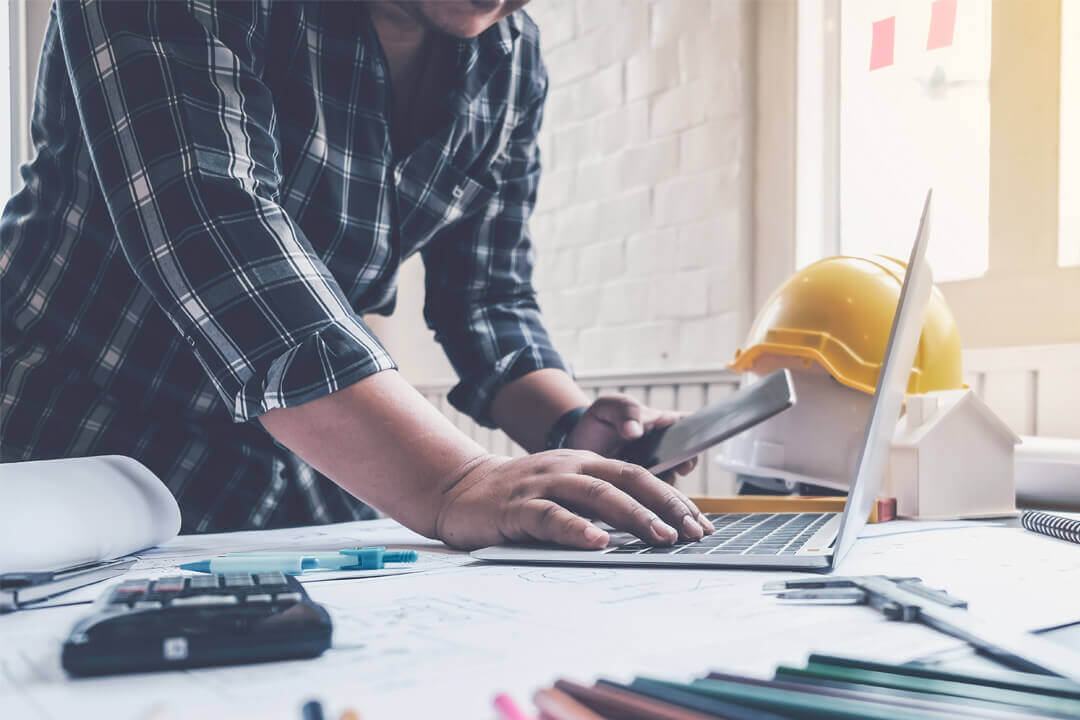 Engineer, serviceman working in the office