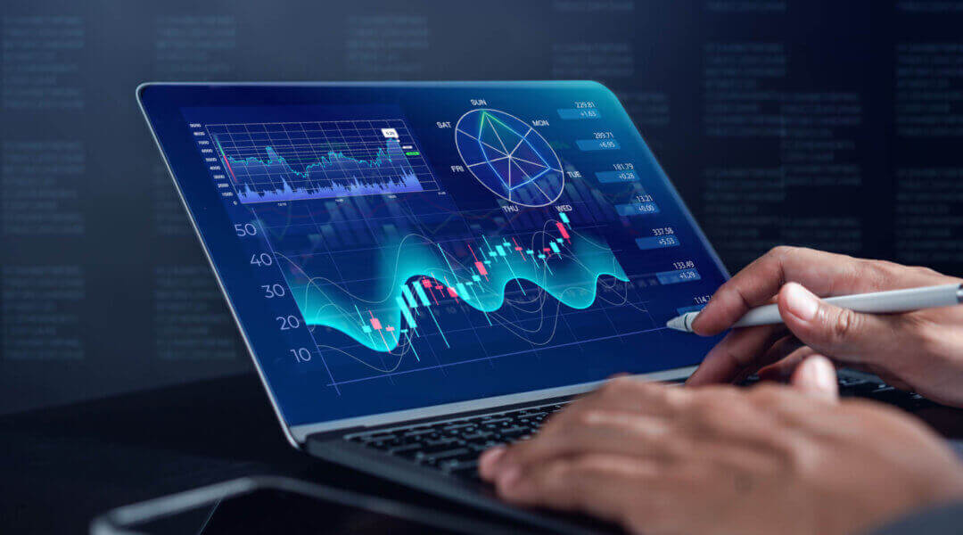 Analyst working with computer in Business Analytics and Data Management System to make report with KPI and metrics connected to database.
