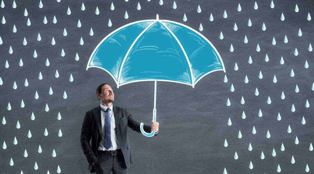 Businessman with creative drawn rain and umbrella sketch.